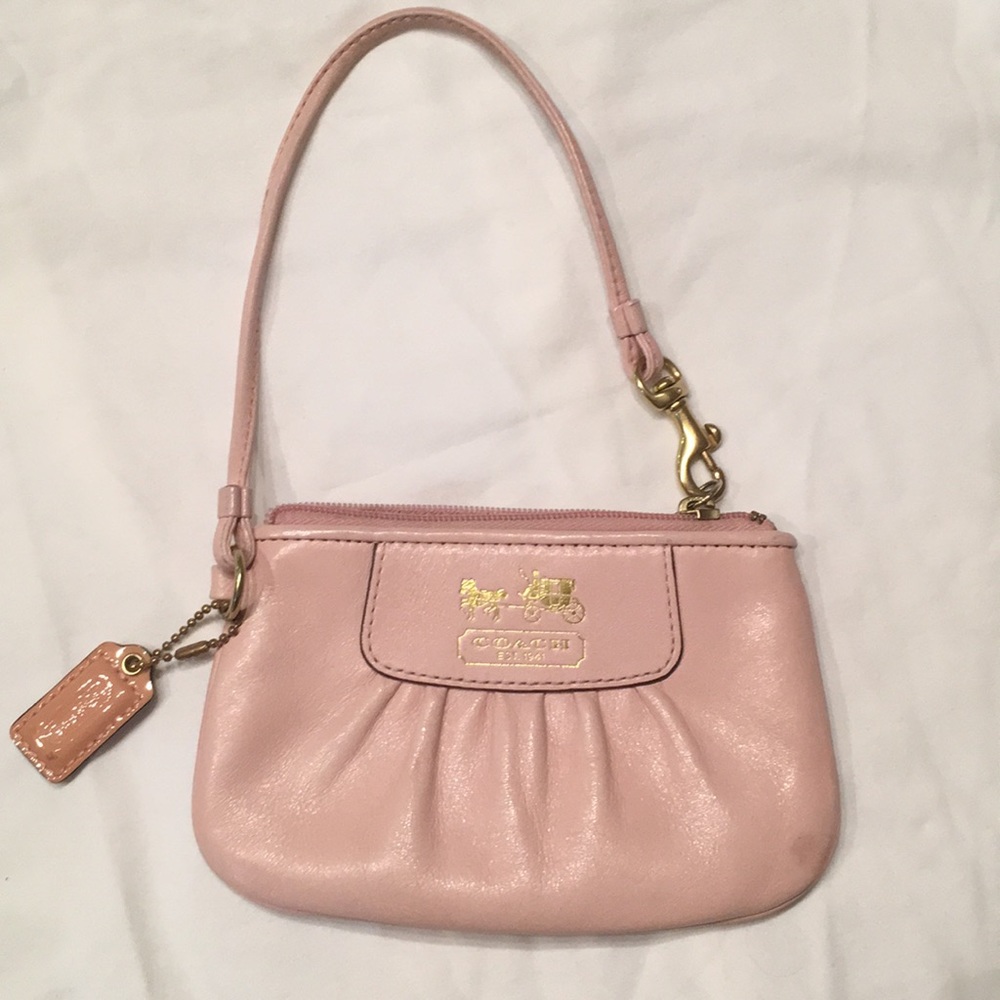 Woman’s pink wallet